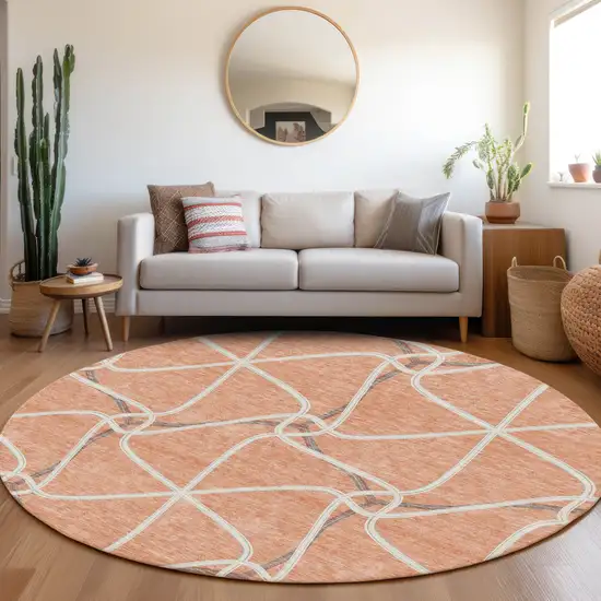 8' Salmon Ivory And Gray Geometric Washable Round Rug With UV Protection Photo 4