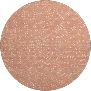Photo of 8' Salmon Ivory And Gray Polka Dot Washable Round Rug With UV Protection