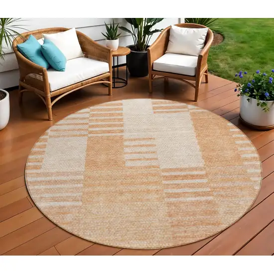 8' Salmon Peach And Ivory Round Striped Washable Indoor Outdoor Area Rug Photo 1