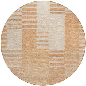 Photo of 8' Salmon Peach And Ivory Round Striped Washable Indoor Outdoor Area Rug