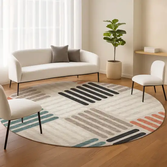 8' Sand Ivory And Black Round Geometric Washable Indoor Outdoor Area Rug Photo 9