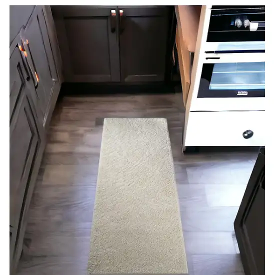8' Ivory Shag Handmade Runner Rug Photo 1