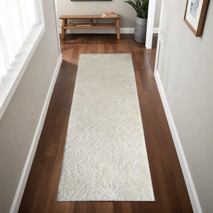 8' Ivory Shag Handmade Runner Rug Photo 1