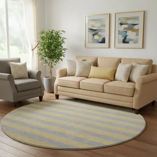 8' Silver And Gold Striped Washable Round Rug With UV Protection Photo 1