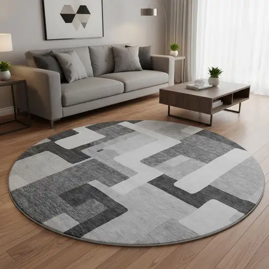 8' Silver And Gray Geometric Washable Round Rug With UV Protection Photo 2