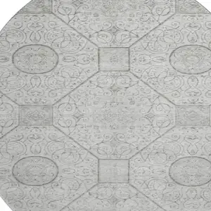 Photo of 8' Silver And Gray Geometric Washable Round Rug With UV Protection