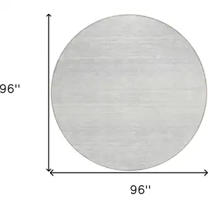 Photo of 8' Silver And Gray Round Striped Washable Indoor Outdoor Area Rug