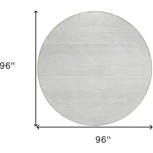 Photo of 8' Silver And Gray Round Striped Washable Indoor Outdoor Area Rug