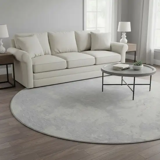 8' Silver And Ivory Abstract Washable Round Rug With UV Protection Photo 2