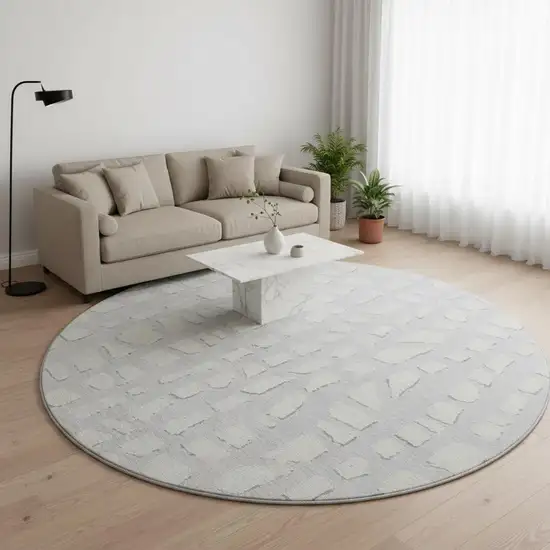 8' Silver And Ivory Cobblestone Washable Round Rug With UV Protection Photo 2