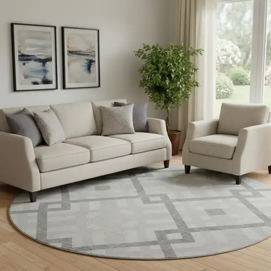 8' Silver And Ivory Geometric Washable Round Rug With UV Protection Photo 1