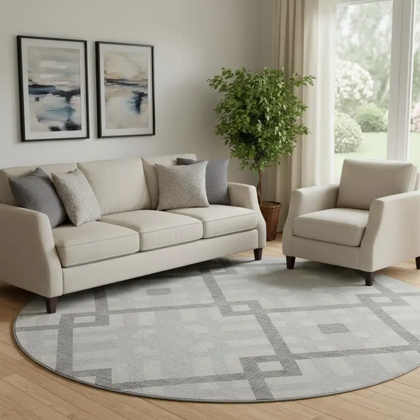 8' Silver And Ivory Geometric Washable Round Rug With UV Protection Photo 1