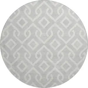 Photo of 8' Silver And Ivory Geometric Washable Round Rug With UV Protection