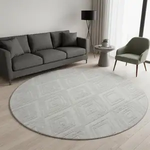 Photo of 8' Silver And Ivory Geometric Washable Round Rug With UV Protection