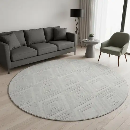 8' Silver And Ivory Geometric Washable Round Rug With UV Protection Photo 1