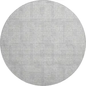 Photo of 8' Silver And Ivory Geometric Washable Round Rug With UV Protection