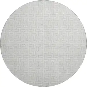 Photo of 8' Silver And Ivory Geometric Washable Round Rug With UV Protection