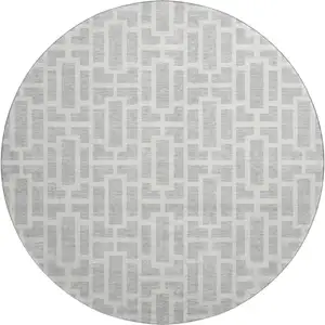 Photo of 8' Silver And Ivory Geometric Washable Round Rug With UV Protection