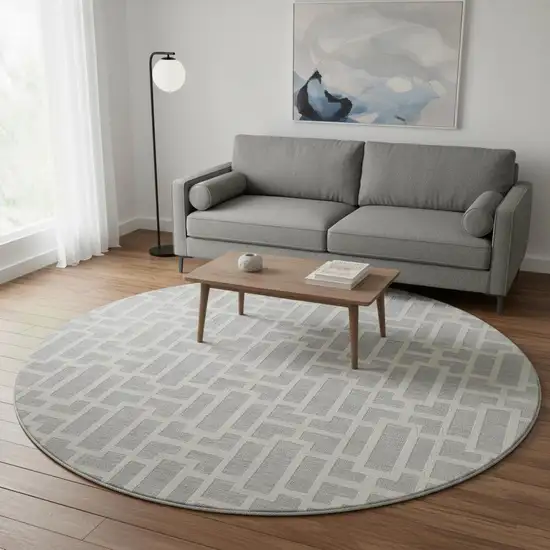 8' Silver And Ivory Geometric Washable Round Rug With UV Protection Photo 2