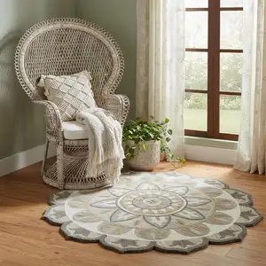 Photo of 5' Silver And Ivory Wool Floral Hand Tufted Round Rug