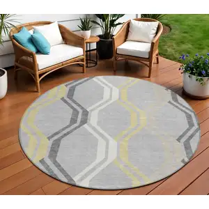 Photo of 8' Silver Beige And Charcoal Round Geometric Washable Indoor Outdoor Area Rug