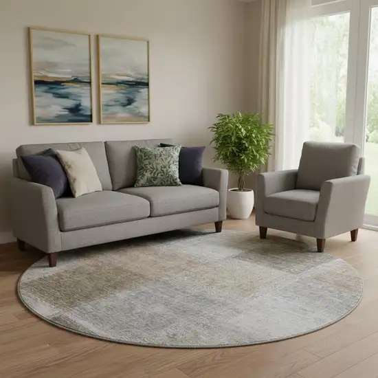 8' Silver Beige And Gray Abstract Washable Round Rug With UV Protection Photo 1