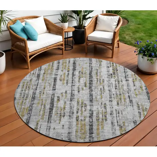 8' Silver Charcoal And Gold Round Abstract Washable Indoor Outdoor Area Rug Photo 1