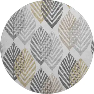 Photo of 8' Silver Gold And Gray Floral Washable Round Rug With UV Protection