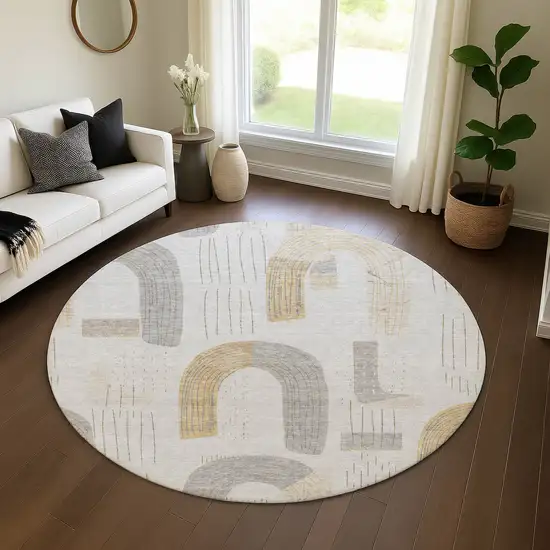 8' Silver Gold And Gray Geometric Washable Round Rug With UV Protection Photo 4