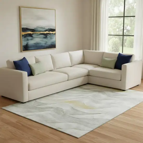 8' Silver Gold And Ivory Abstract Washable Area Rug With UV Protection Photo 2