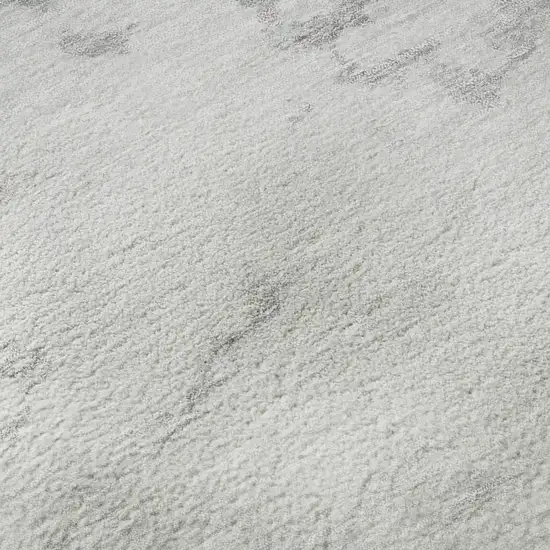 8' Silver Gold And Ivory Abstract Washable Round Rug With UV Protection Photo 9