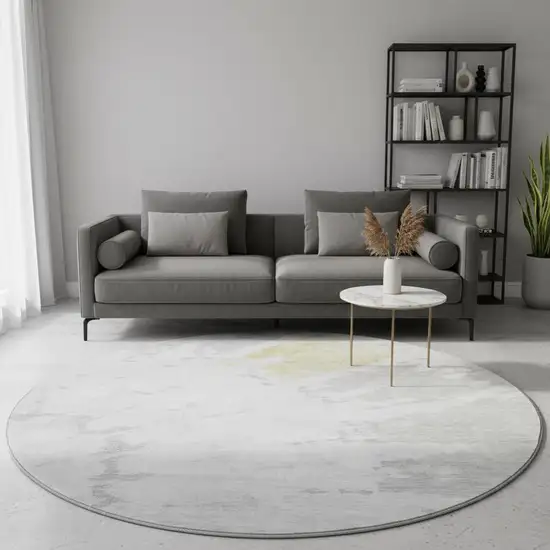 8' Silver Gold And Ivory Abstract Washable Round Rug With UV Protection Photo 2