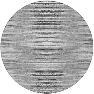 Photo of 8' Silver Gray And Charcoal Round Striped Washable Indoor Outdoor Area Rug