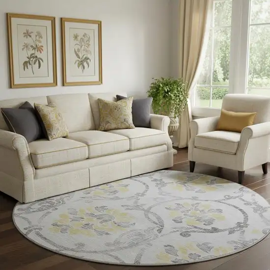8' Silver Gray And Gold Floral Washable Round Rug With UV Protection Photo 1