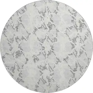 Photo of 8' Silver Gray And Ivory Abstract Washable Round Rug With UV Protection