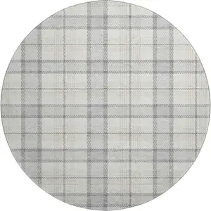 Photo of 8' Silver Ivory And Gray Plaid Washable Round Rug With UV Protection
