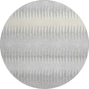 Photo of 8' Silver Ivory And Gray Striped Washable Round Rug With UV Protection