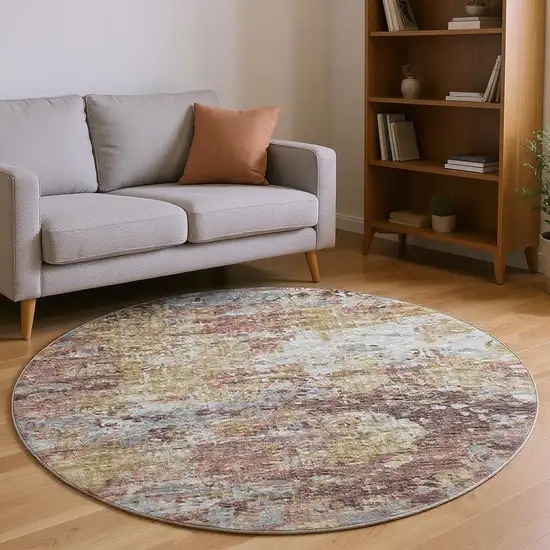 8' Silver Mauve And Gold Abstract Washable Round Rug With UV Protection Photo 1