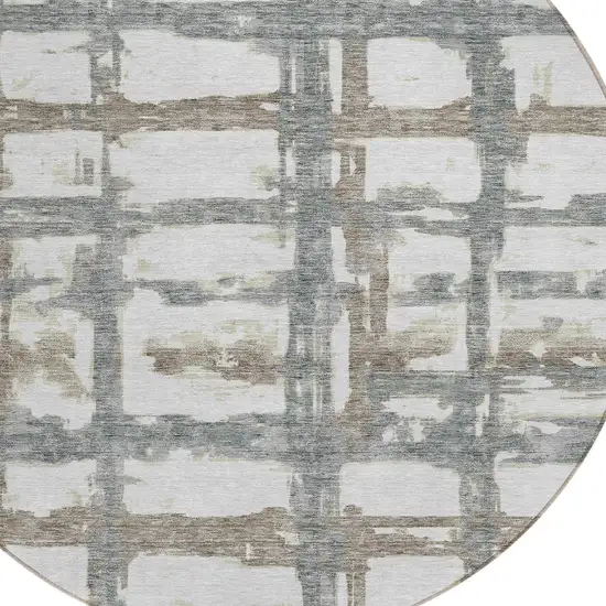 8' Silver Taupe And Gray Round Striped Washable Indoor Outdoor Area Rug Photo 4