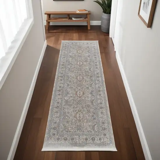 8' Silver Taupe and Blue Oriental Power Loom Worn Faded Runner Rug With Fringe Photo 1