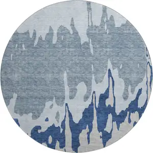 Photo of 8' Sky Blue And Beige Abstract Washable Round Rug With UV Protection