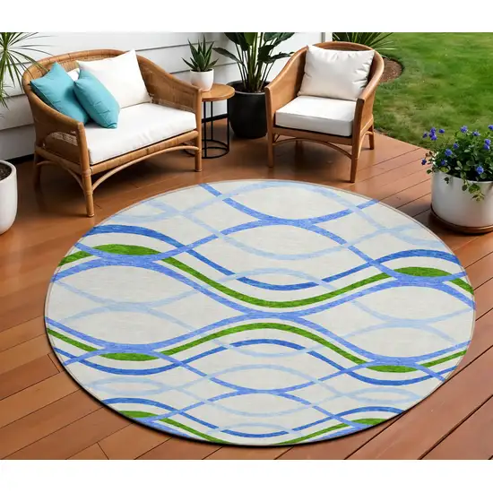 8' Sky Blue And Beige Round Abstract Washable Indoor Outdoor Area Rug Photo 1