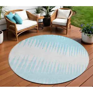 Photo of 8' Sky Blue And Gray Round Striped Washable Indoor Outdoor Area Rug