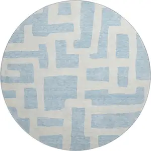 Photo of 8' Sky Blue And Ivory Abstract Geometric Washable Round Rug With UV Protection