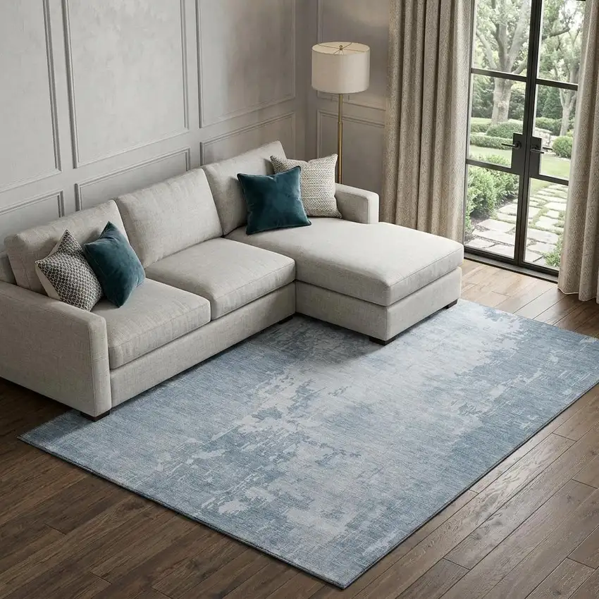 8' Sky Blue And Ivory Abstract Washable Area Rug With UV Protection Photo 1