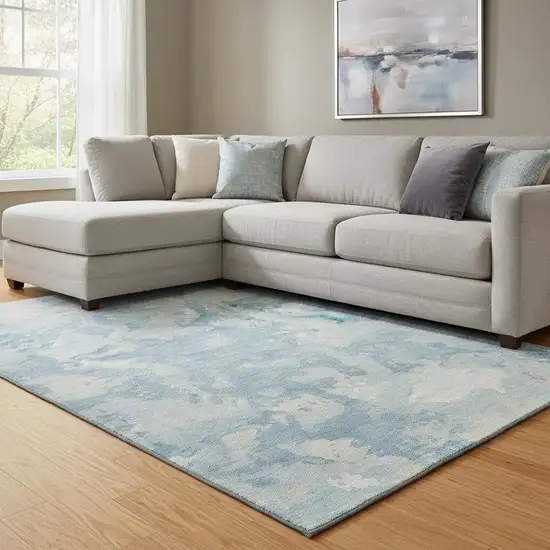 8' Sky Blue And Ivory Abstract Washable Area Rug With UV Protection Photo 2