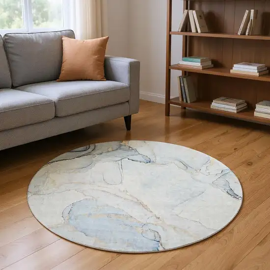 8' Sky Blue And Ivory Abstract Washable Round Rug With UV Protection Photo 2