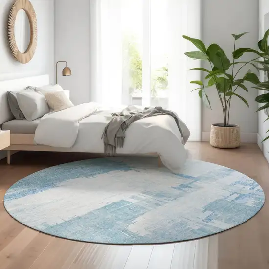 8' Sky Blue And Ivory Abstract Washable Round Rug With UV Protection Photo 4