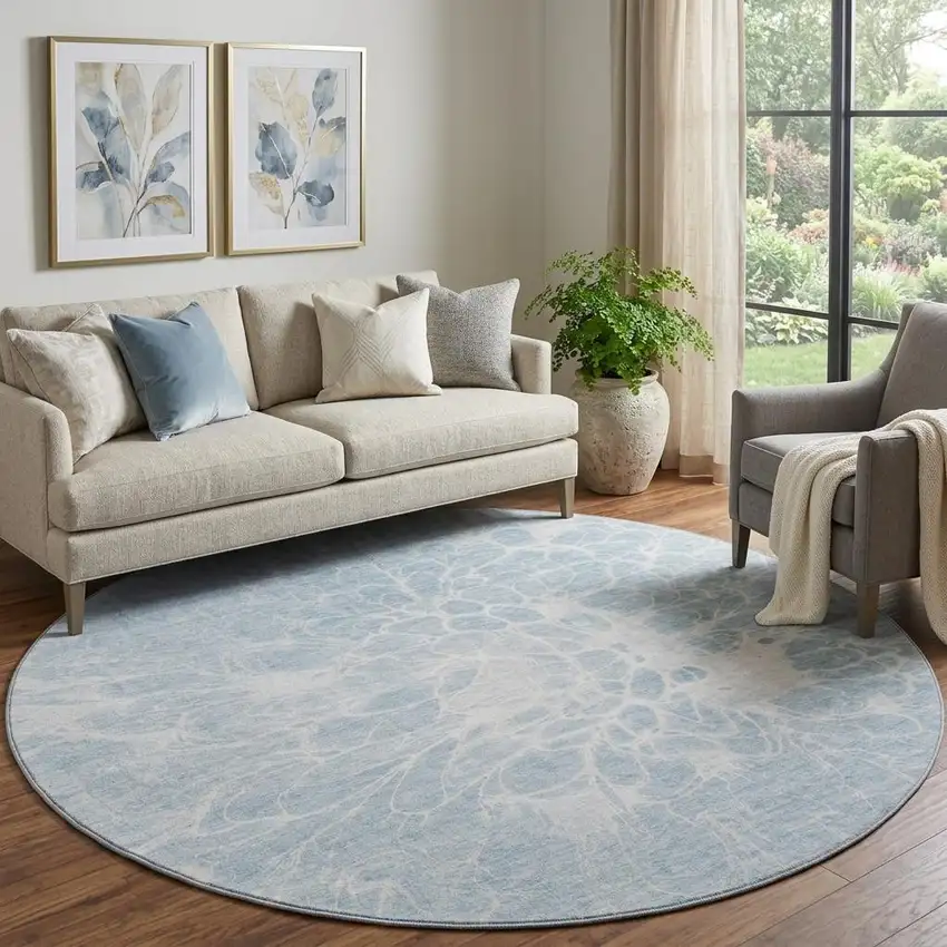 8' Sky Blue And Ivory Abstract Washable Round Rug With UV Protection Photo 1