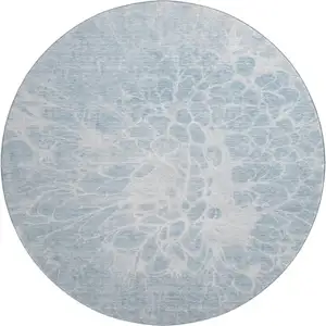 Photo of 8' Sky Blue And Ivory Abstract Washable Round Rug With UV Protection
